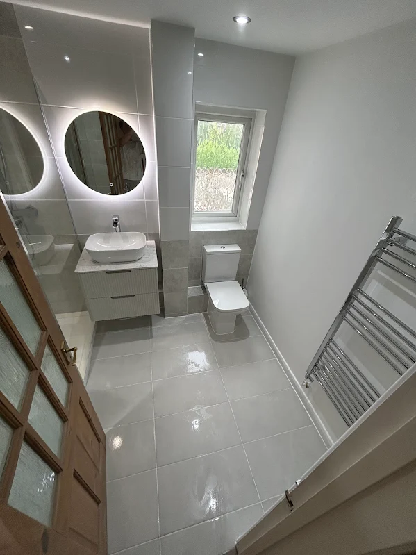 https://kw.webizdemo.com/sinclairenovations/wp-content/uploads/2026/06/bathroom-2.webp