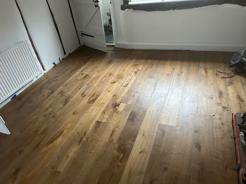 https://kw.webizdemo.com/sinclairenovations/wp-content/uploads/2026/06/flooring-2.webp